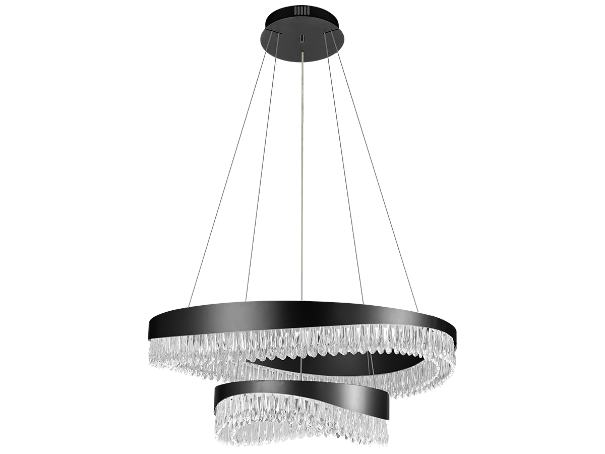 Kontrast tmavého povrchu a křišťálových detailů vytváří výrazný světelný dojem v moderním interiéru.